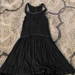 Black babydoll blouse with zipper detail